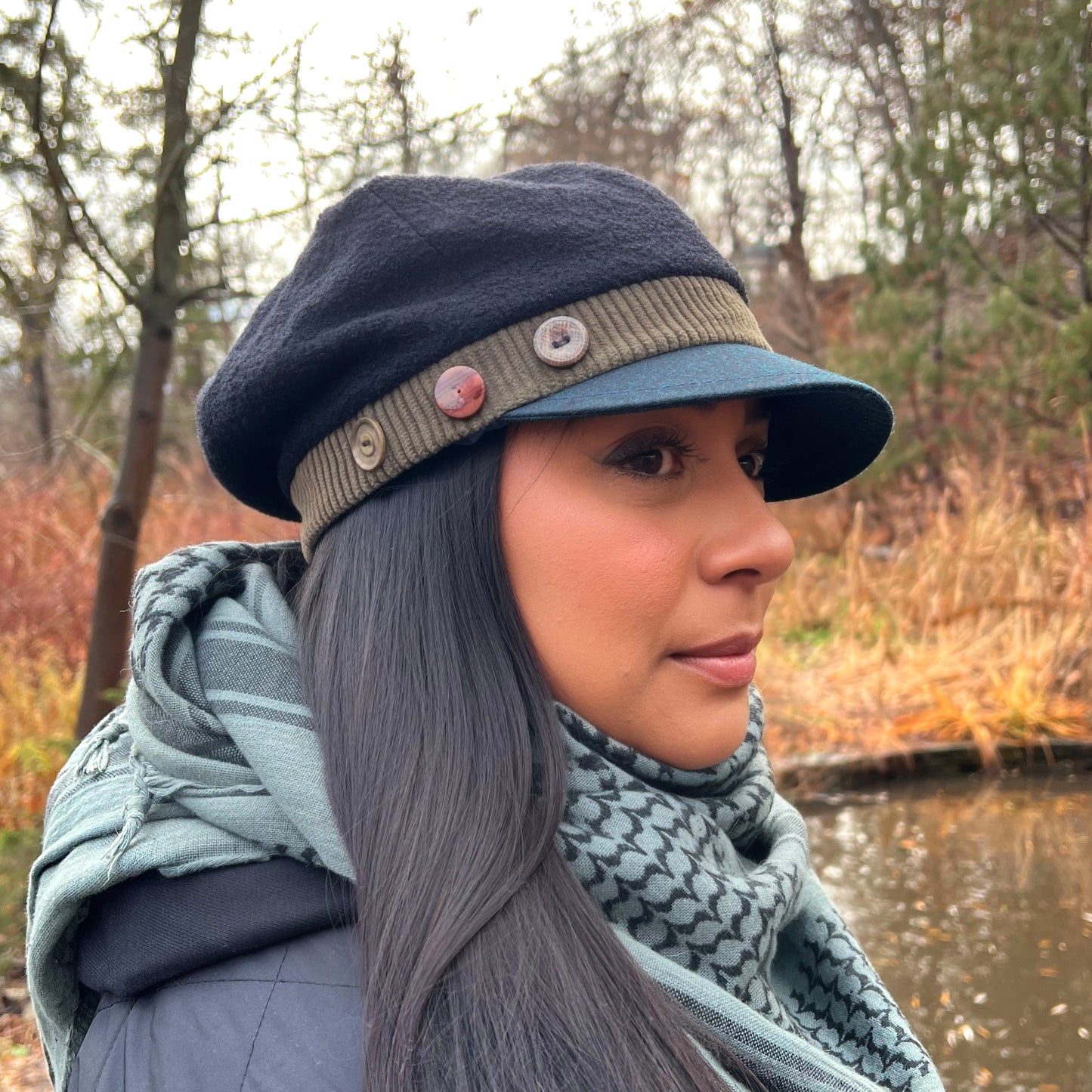 The Rowan Wool Bouclé Cap Medium Olive Band Blue Peak