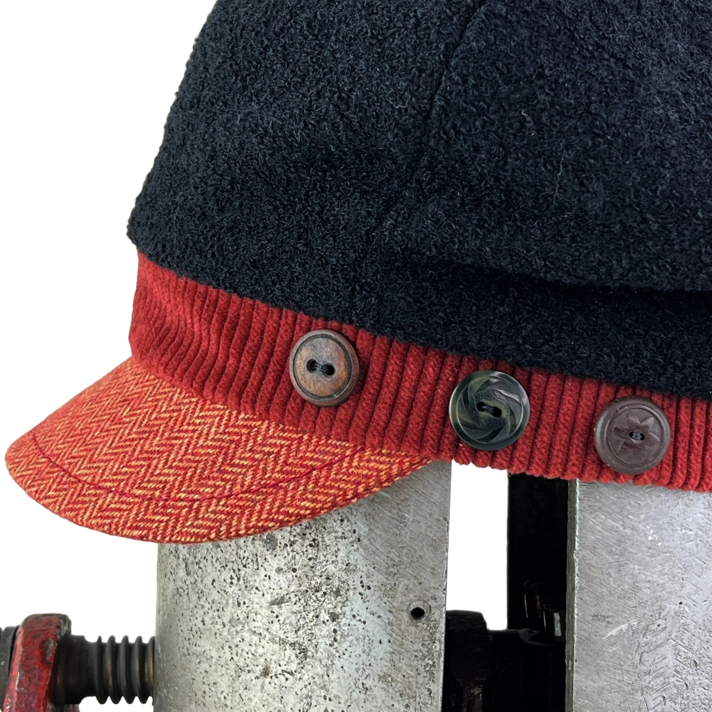 The Rowan Wool Bouclé Cap Medium Papaya Red Band Orange Peak